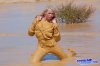 girl_fully_covered_in_mud_005.jpg